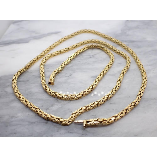 306 - A fancy link chain Necklace, stamped 750, 80cms long, approx 78.60gms