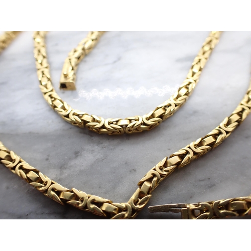 306 - A fancy link chain Necklace, stamped 750, 80cms long, approx 78.60gms