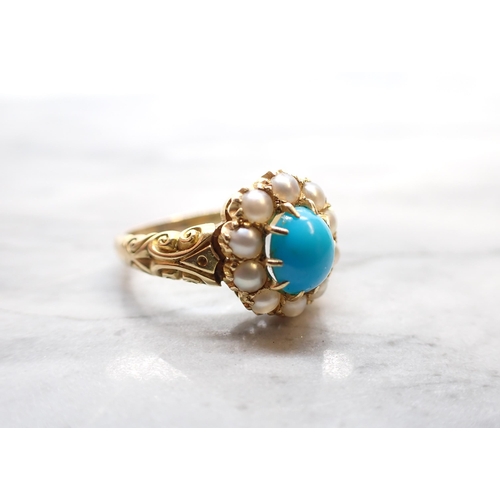 314 - A late 19th Century Turquoise and Seed Pearl Cluster Ring claw-set oval turquoise cabochon within fr... 