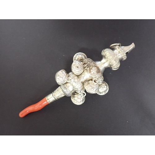 343 - An antique style white metal Child's Rattle with coral mount, possibly Indian, 5in