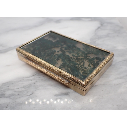 344 - A Continental engraved gold Box the hinged lid set moss agate within floral embossed frame, stamped ... 