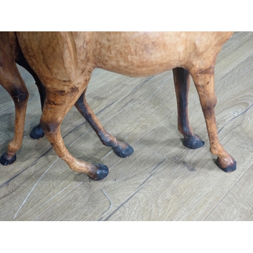 345 - A pair of 20th Century leather Figures of Antelope 21in H