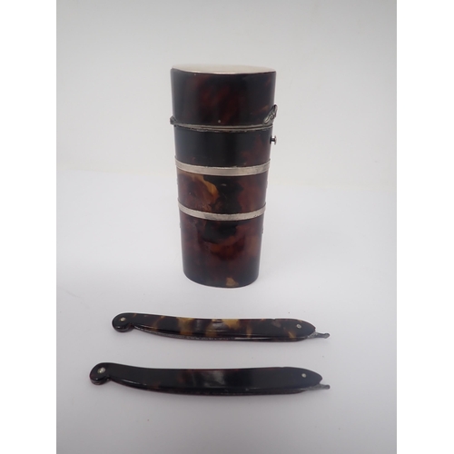 35 - A silver and tortoiseshell oval Etui containing two Surgeons Lancets