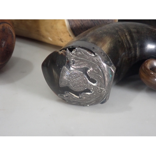 355 - A 19th Century horn Mull with white metal thistle design, a horn Container, and three horn Flasks