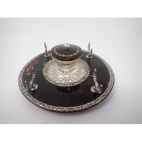 37 - An Edward VII silver and tortoiseshell circular Inkstand, London 1901, fitted silver mounted cut gla... 