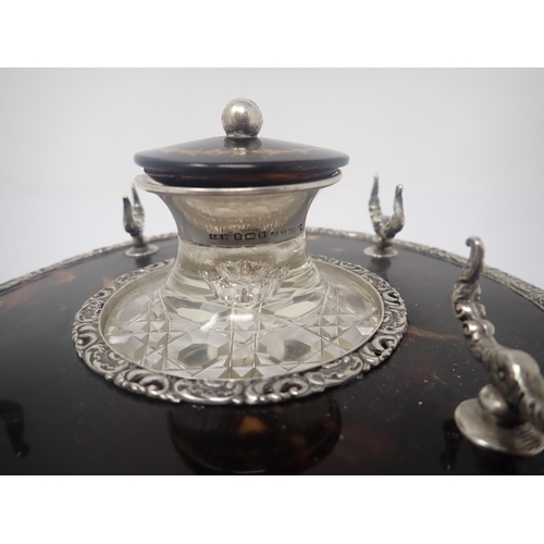 37 - An Edward VII silver and tortoiseshell circular Inkstand, London 1901, fitted silver mounted cut gla... 