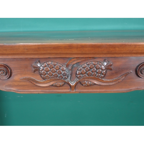 386 - A Chinese hardwood Altar Table with carved scroll, leafage and fruit designs to the rails on tall su... 