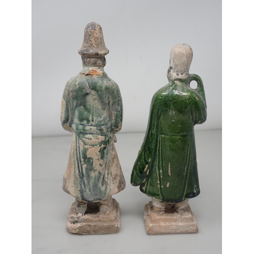 389 - A green glazed Figure on horseback, possibly late Ming dynasty, 12in H, and two similar figures, 8½ ... 