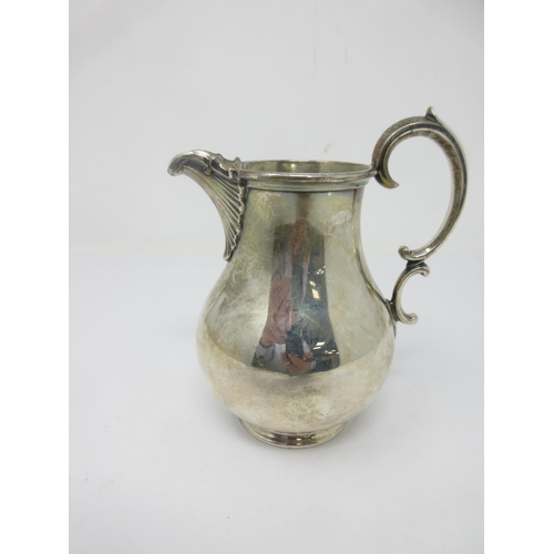 39 - A Victorian silver baluster Jug engraved initials, London 1853, maker: Barnards