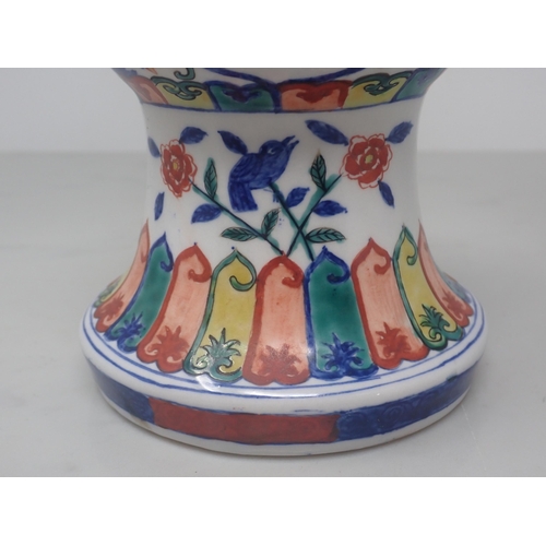 392 - A Chinese Doucai Vase with flared rim, tapering to the neck with bulbous body and spreading foot, de... 