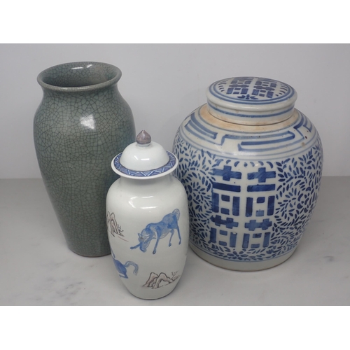 399 - A Chinese blue and white Ginger Jar and Cover with design of foliage, 9 1/2in H, cover chipped; a gr... 