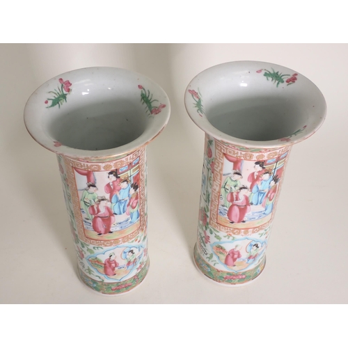 415 - A pair of 19th Century famille rose Vases, cylindrical with flared rims, decorated panels of figures... 