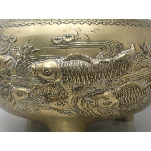 416 - A late 19th Century large Oriental bronze Jardiniere, the frieze design in relief of fish swimming i... 