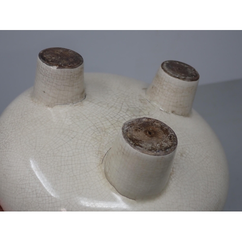 417A - A Chinese ceramic Pot with wooden cover and three peg supports, 8in diam.