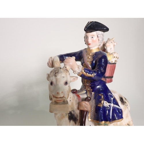 421 - A pair of 19th Century Derby Figures of The Welsh Tailor and his Wife, each figure riding a goat, th... 