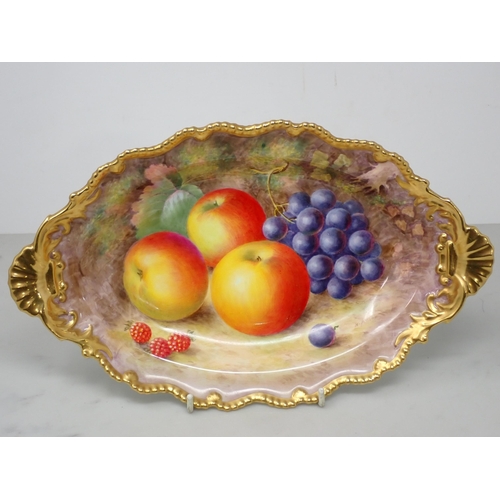 432 - A Royal Worcester oval shaped two handled Dish with shell moulding, painted still life of fruit, app... 