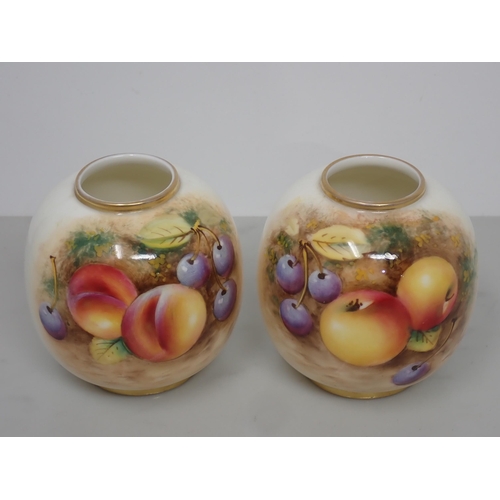 435 - A pair of Royal Worcester ovoid Vases painted still life of fruit, signed 3in H