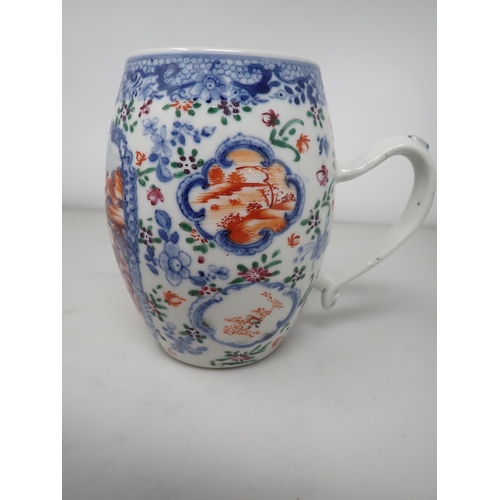 438 - A Chinese barrel shape Mug, painted figures in bright enamels within shaped reserve, floral surround... 