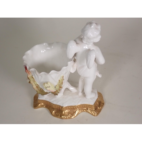 439 - Two Moore Bowls with winged cherubs and gilt detail, A/F, and another Figure of similar design