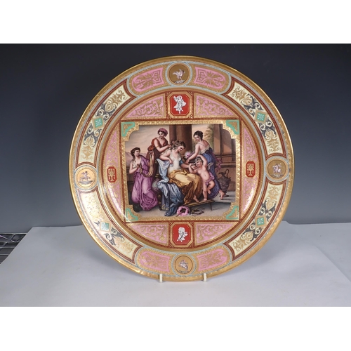 448 - A Royal Vienna handpainted Cabinet Plate with classical scene of maidens and a winged cherub, surrou... 