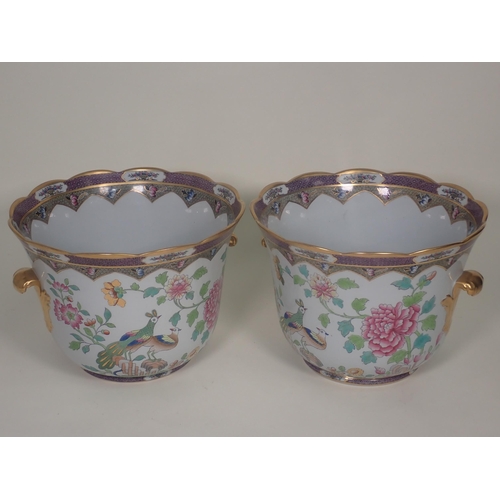 449 - A pair of Spode porcelain Wine Coolers decorated exotic birds amongst flowers with gilded leafage ha... 