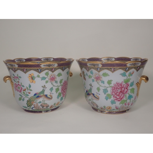 449 - A pair of Spode porcelain Wine Coolers decorated exotic birds amongst flowers with gilded leafage ha... 