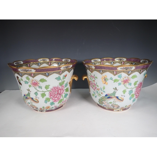 449 - A pair of Spode porcelain Wine Coolers decorated exotic birds amongst flowers with gilded leafage ha... 