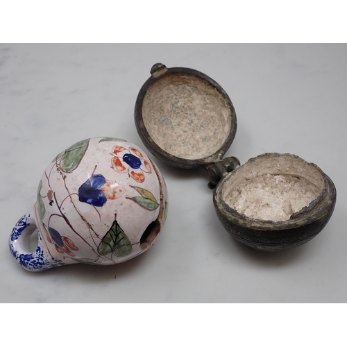 457 - Two Turkish ceramic Ovoids decorated angels on a white ground 3 1/2in, a pottery Rattle decorated fl... 