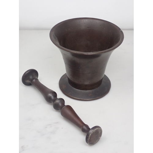 473 - An 18th Century bronze Pestle and Mortar of flared form 4in H