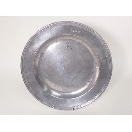 480 - A c.1700 Pewter Charger with touchmarks for John Silk, with reeded edge, 13 1/2in diam