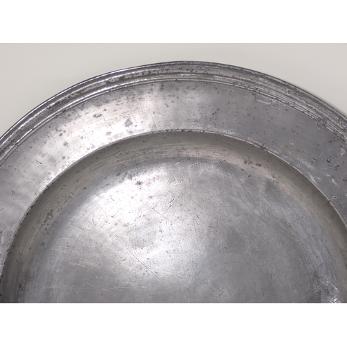 481 - A c.1700 Pewter Charger with touchmarks for John Baskerville, with reeded edge and stamped initials ... 