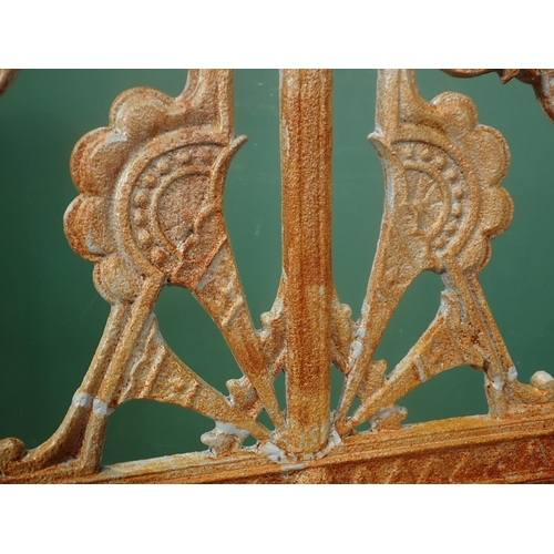 486A - A Coalbrookdale cast iron Chair designed by Christopher Dresser, with pierced back, cast simulated b... 