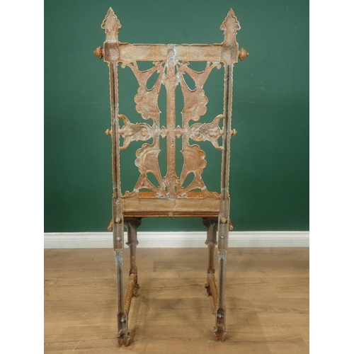 486A - A Coalbrookdale cast iron Chair designed by Christopher Dresser, with pierced back, cast simulated b... 