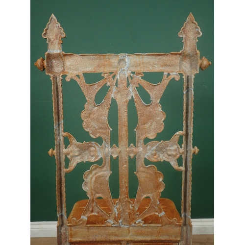 486A - A Coalbrookdale cast iron Chair designed by Christopher Dresser, with pierced back, cast simulated b... 