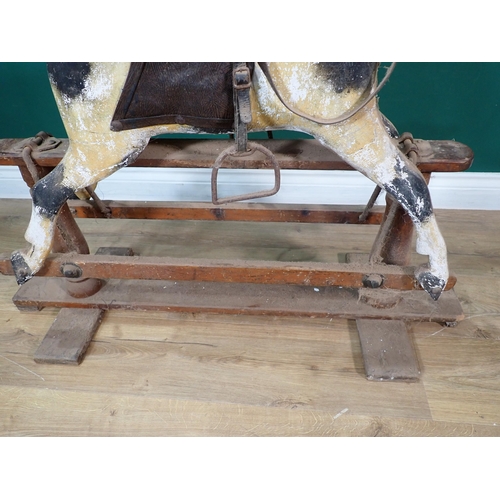 495 - A 19th Century dappled palomino Rocking Horse of small proportions with original saddle and bridle o... 