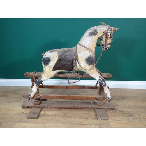 495 - A 19th Century dappled palomino Rocking Horse of small proportions with original saddle and bridle o... 