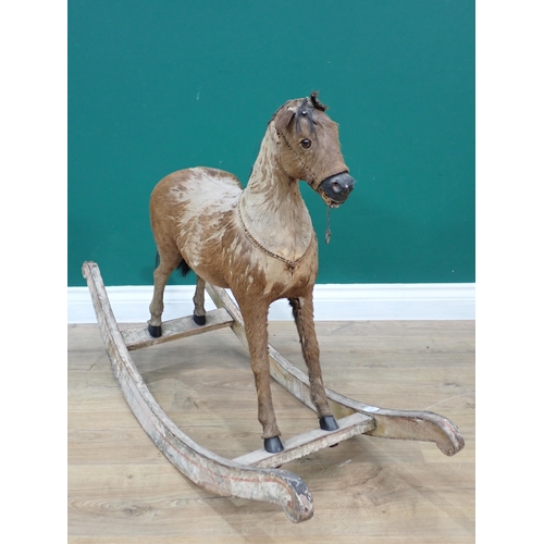 497 - An antique fur covered Rocking Horse on white painted rockers 3ft 2in L x 2ft 2in H