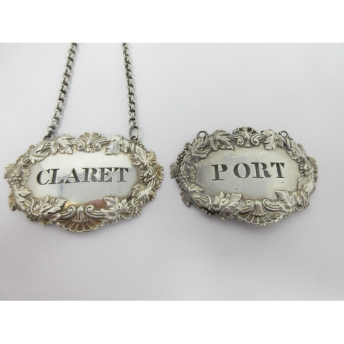 5 - A pair of George IV silver Labels, Claret and Port, Birmingham 1826, maker: Matthew Boulton, one lac... 