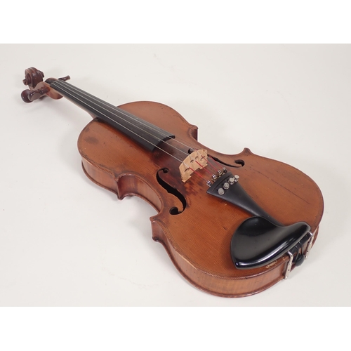 507 - A 7/8ths Violin labelled Antonio Stradivarious, Farrebar with two piece back with bow in case