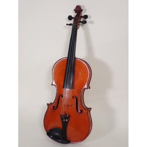 508 - A full size Violin with single perfling to the top and the two piece back with interior label 