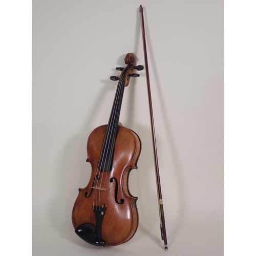 509 - A 19th Century Stainer Violin with perfling to the top and two piece back which has a later inscript... 