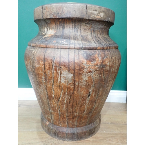 513 - A large Lignum Vitae Mortar, possibly 18th Century, urn shaped and with incised banded decoration, 2... 