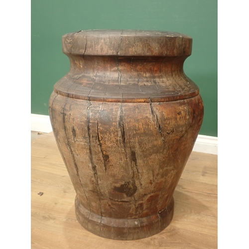 513 - A large Lignum Vitae Mortar, possibly 18th Century, urn shaped and with incised banded decoration, 2... 