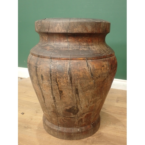 513 - A large Lignum Vitae Mortar, possibly 18th Century, urn shaped and with incised banded decoration, 2... 