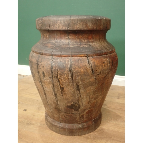 513 - A large Lignum Vitae Mortar, possibly 18th Century, urn shaped and with incised banded decoration, 2... 