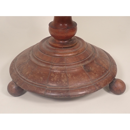 515 - A 19th Century mixed wood Wine Cooler of flared form on turned column and circular base with three s... 