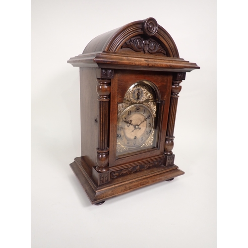 527 - A late 19th Century Continental Bracket Clock, having three train movement chiming on four bars in a... 