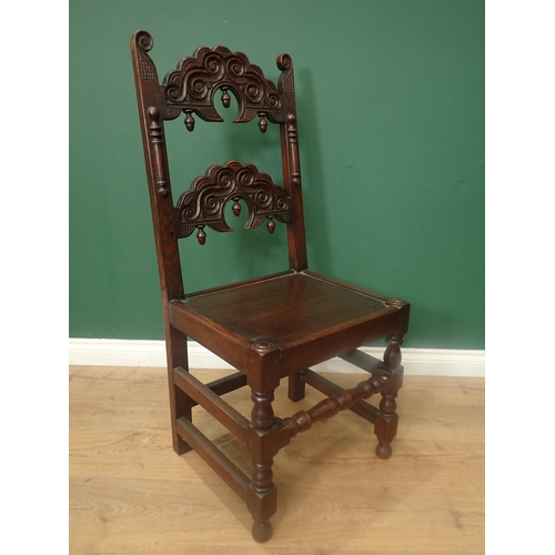 541 - A matched set of ten Charles II oak Derbyshire style Dining Chairs with carved backs, solid seats on... 