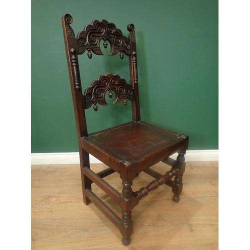 541 - A matched set of ten Charles II oak Derbyshire style Dining Chairs with carved backs, solid seats on... 