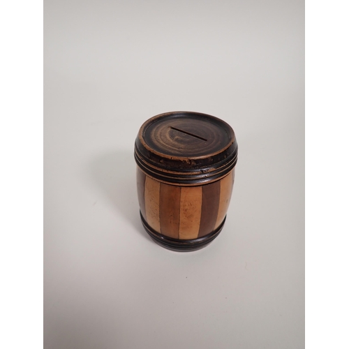 550 - A 19th Century Scottish mixed wood Money Box of barrel shape, 3¼in